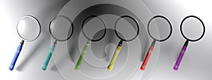 Series of magnifiers with colorful handels - 3D rendering photo