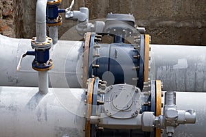 Series of measuring instruments, pressure gauges and temperature indicators, inserted into pipes, on a high pressure cooling water