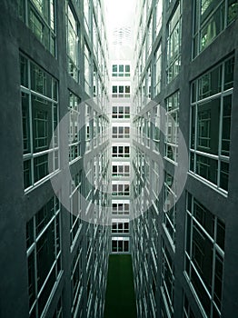 Series of narrow claustrophobia courtyard with glass window