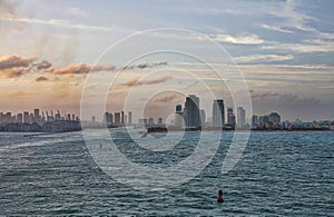 A series of photos of a cruise ship as it leaves the Port of Miami Cruise Terminal and heads for open water