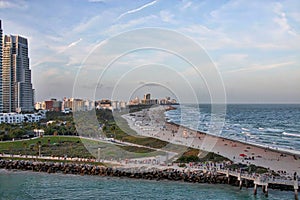 A series of photos of a cruise ship as it leaves the Port of Miami Cruise Terminal and heads for open water