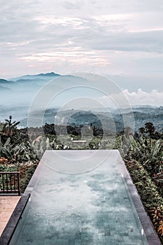 Series of Pink Hued Images - infinity pool above the clouds photo