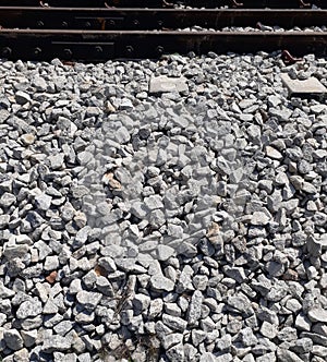 A series of railways on top of split stones,