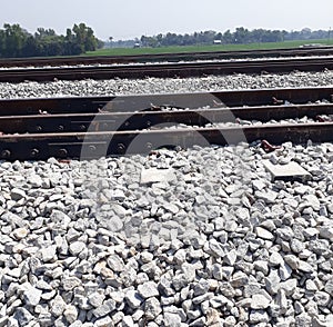 A series of railways on top of split stones,