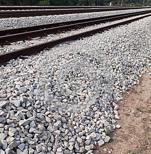 A series of railways on top of split stones,