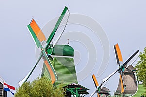 Series of windmills along the Zaan river photo