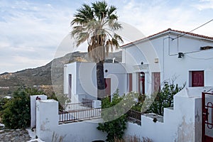 Serifos Island Chora, Cyclades. Greece. Folklore Museum fence and entrance, whitewashed building