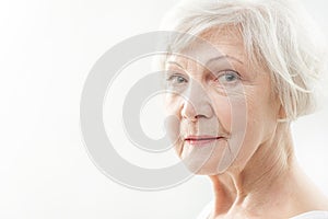 Serine senior lady with wrinkles on face