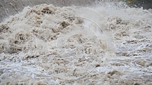 The Serio river swollen after heavy rains. Province of Bergamo, northern Italy photo