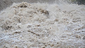 The Serio river swollen after heavy rains. Province of Bergamo, northern Italy photo