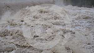 The Serio river swollen after heavy rains. Province of Bergamo, northern Italy photo