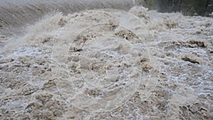 The Serio river swollen after heavy rains. Province of Bergamo, northern Italy photo