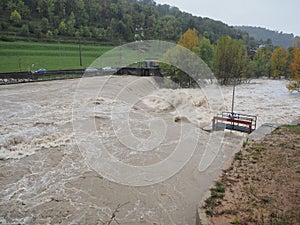 The Serio river swollen after heavy rains. Province of Bergamo, northern Italy photo