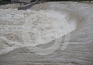 The Serio river swollen after heavy rains. Province of Bergamo, northern Italy photo