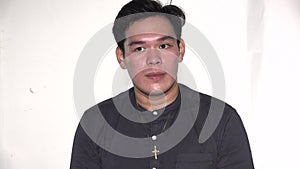 Serious Adult Christian Asian Man Isolated