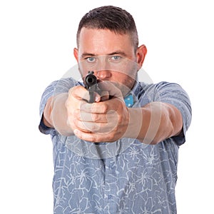 Serious adult man with a beard in a blue bow tie in summer shirt with a firearm in hand in hand aiming at you on an isolated white