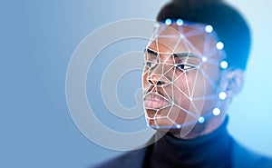 Serious African American businessman with facial recognition by