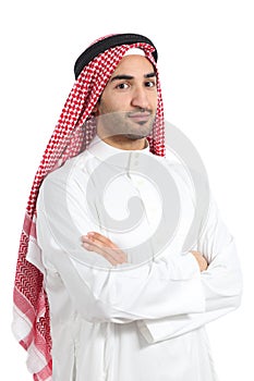 Serious arab saudi emirates man posing with folded arms