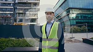 Serious architect build inspector property developer city urban building construction industry Caucasian middle-aged man