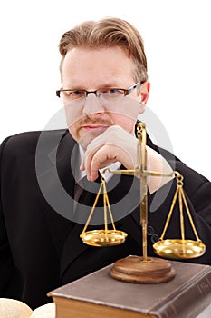 Serious attorney with golden scale