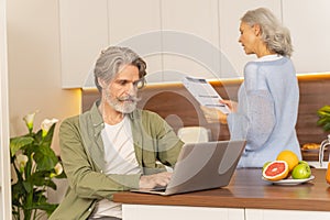 Serious attractive man checking his email box