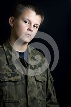 Serious boy scout portrait