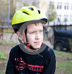 Serious boy wearing helmet