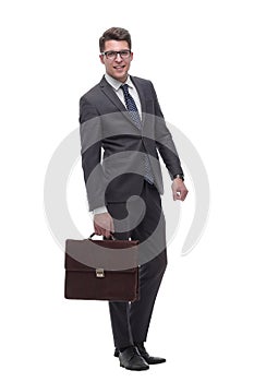 Serious business man with a leather briefcase. isolated on white