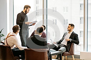 Serious business people hold meeting in office