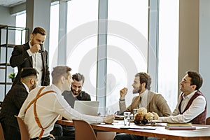 Serious business people hold meeting in office