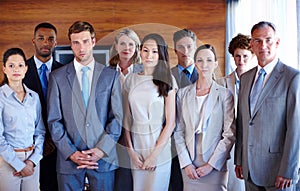 They are serious about business. Portrait of a diverse group of businesspeople in the office.