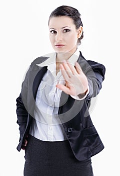 Serious business woman showing stop sign.isolated on white