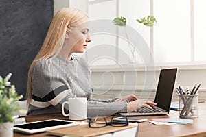 Business woman working on laptop at office