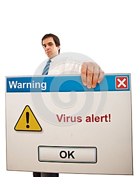 Serious businessman with computer virus alert