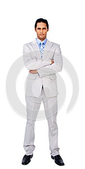 Serious businessman with folded arms