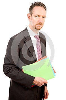 Serious Businessman Holding Papers