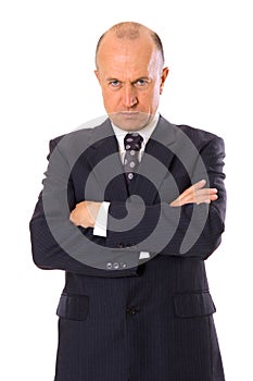 Serious businessman looking at camera