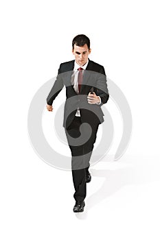 Serious businessman over white background