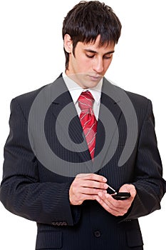 Serious businessman with palmtop