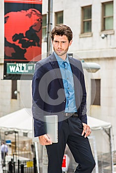 Serious businessman on street in New York photo