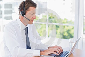 Serious businessman wearing a headset