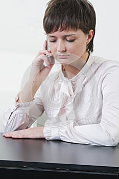 Serious businesswoman on cellphone