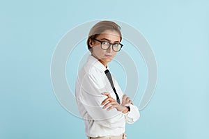 Serious Businesswoman Posing Studio. Portrait of Thoughtful Woman Standing