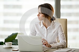 Serious businesswoman thinking about business problem solution