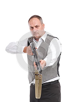 Serious Caucasian man with in business formal outfit using rifle. Isolated on white