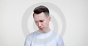 Serious Caucasian Man Thinking over White Background