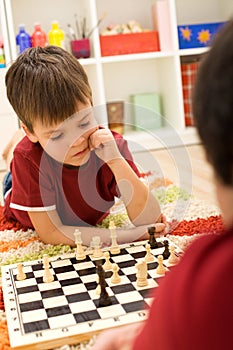 Serious chess player kid