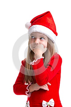 Serious christmas girl with the fist under the chin, looking up, wearing a santa hat isolated over a white background