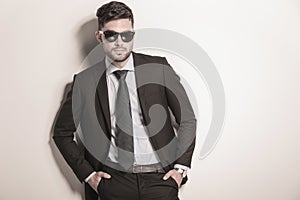 Serious and cool business man wearing sunglasses