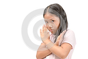 Serious cute girl showing crossed hands or forbidding gesture